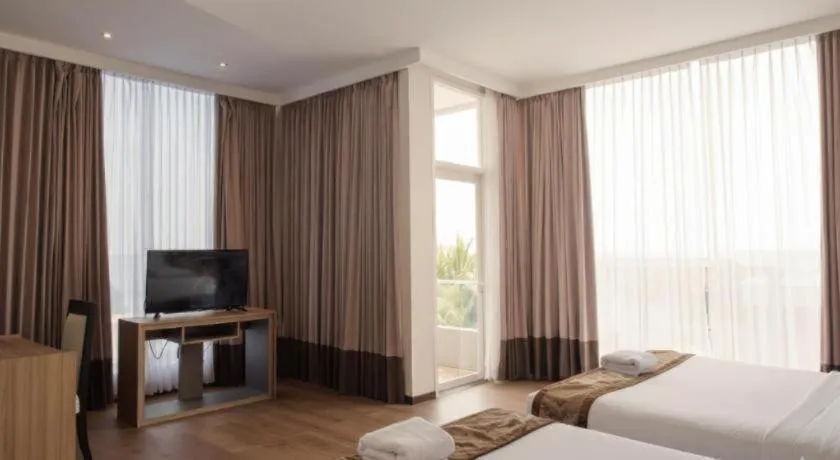 Bed in D'Season Premiere Hotel