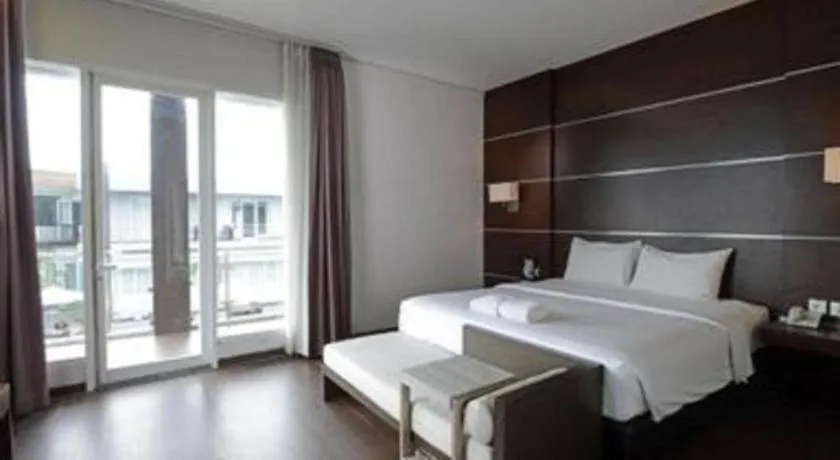 Bed in D'Season Premiere Hotel