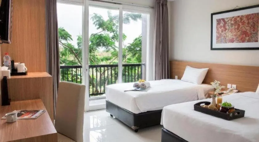 Bed in D'Season Premiere Hotel