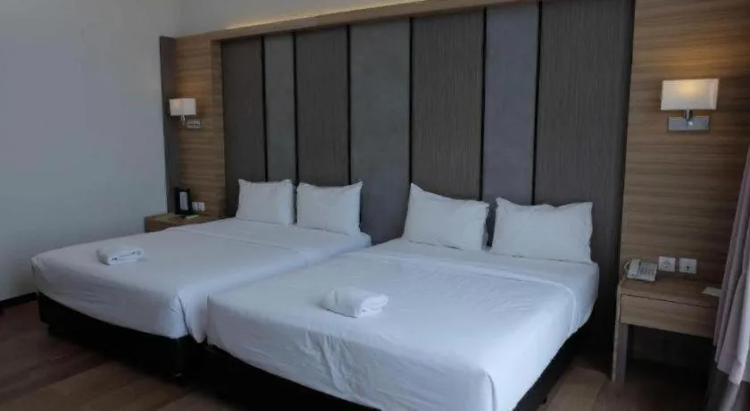 Bed in D'Season Premiere Hotel