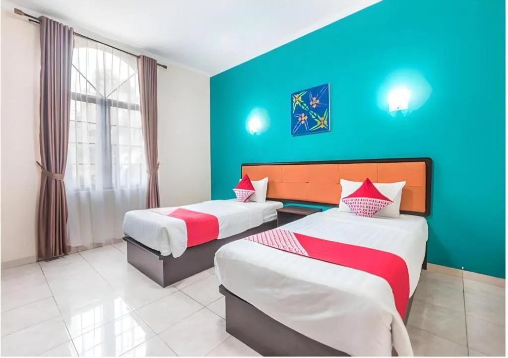 Bed in Ole Suite Hotel