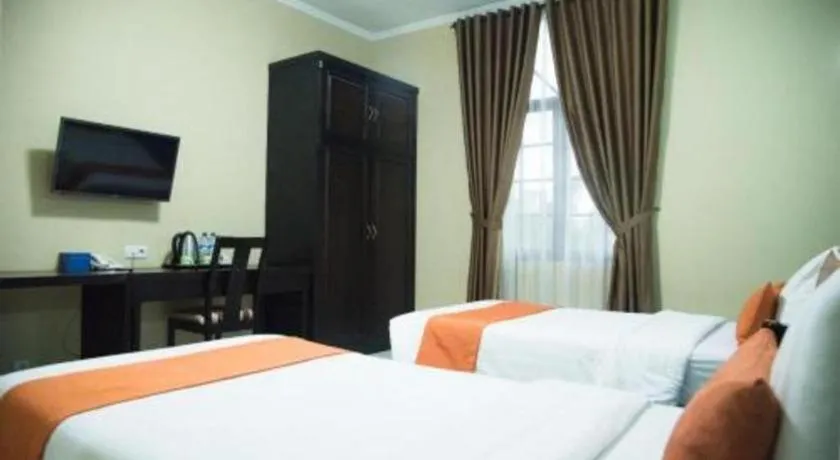 Bed in Ole Suite Hotel