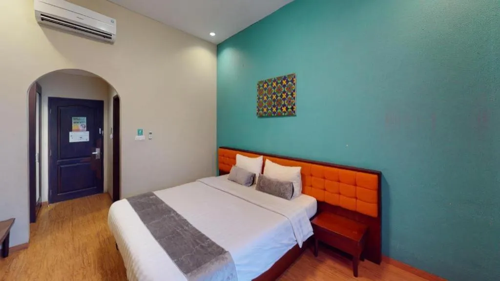 Bed in Ole Suite Hotel