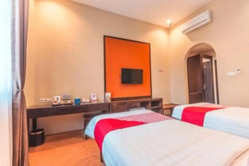 Bed in Ole Suite Hotel