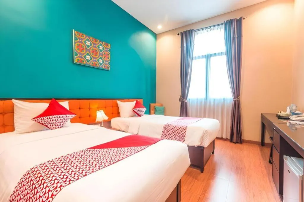 Bed in Ole Suite Hotel