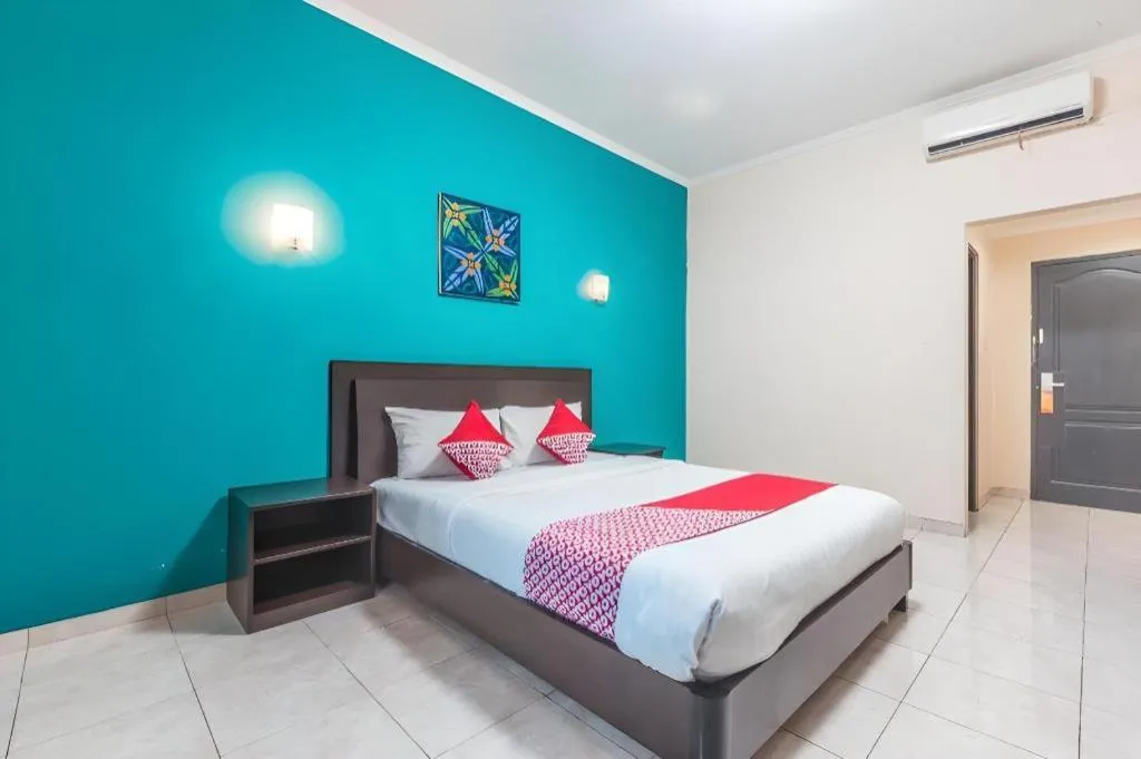 Bed in Ole Suite Hotel