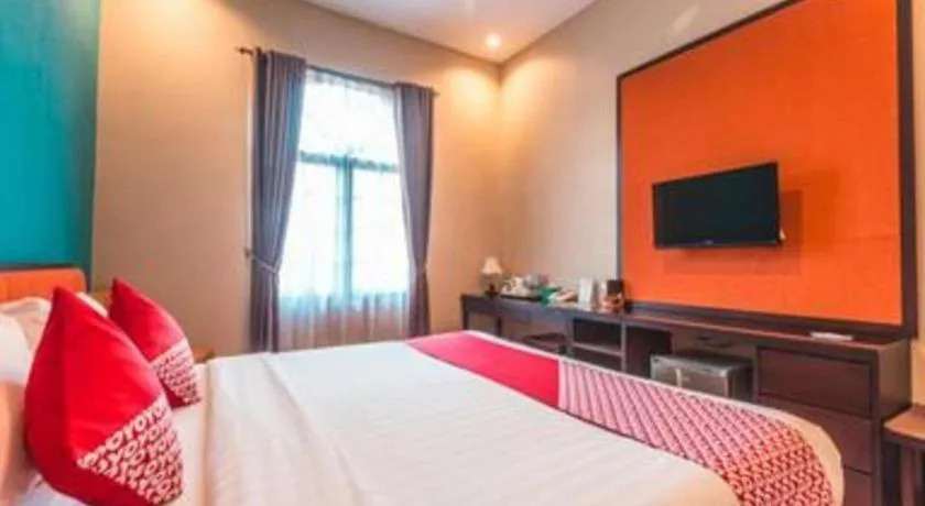 Bed in Ole Suite Hotel