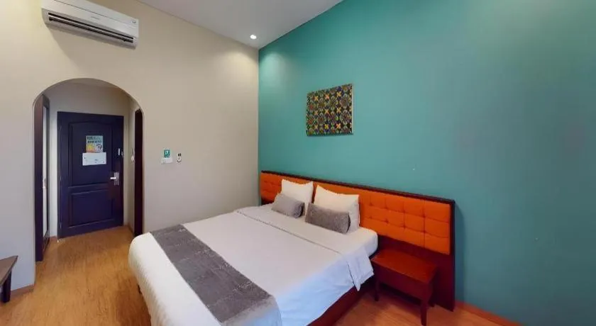 Bed in Ole Suite Hotel