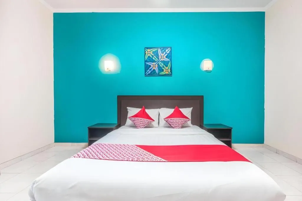 Bed in Ole Suite Hotel