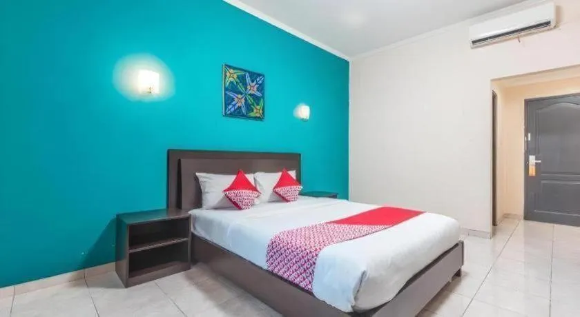 Bed in Ole Suite Hotel