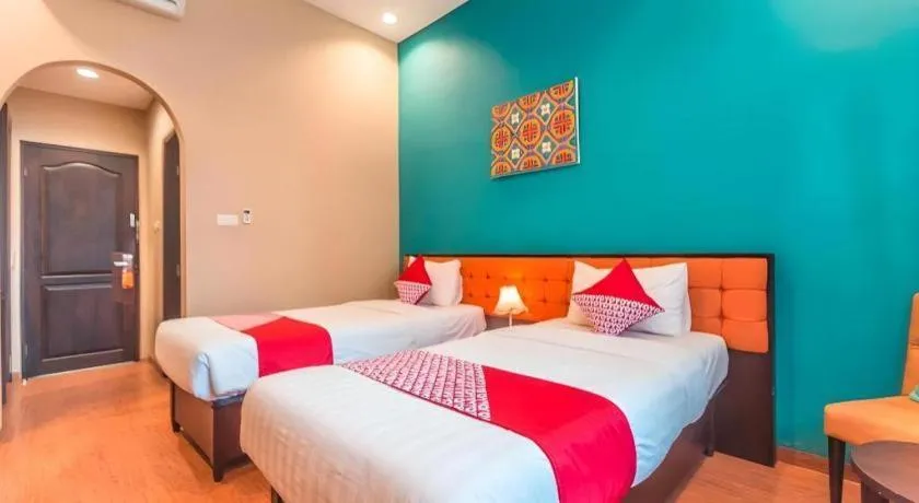 Bed in Ole Suite Hotel