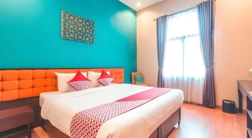 Bed in Ole Suite Hotel