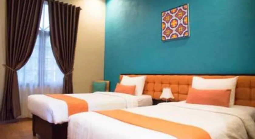 Bed in Ole Suite Hotel