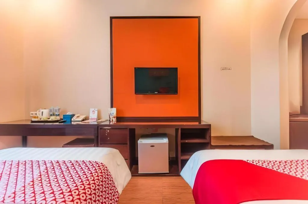 Bed in Ole Suite Hotel