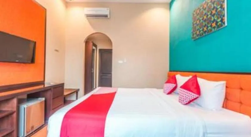 Bed in Ole Suite Hotel