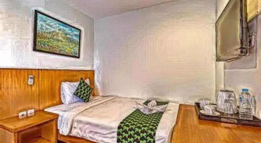 Bed in Hadi Poetra Hotel