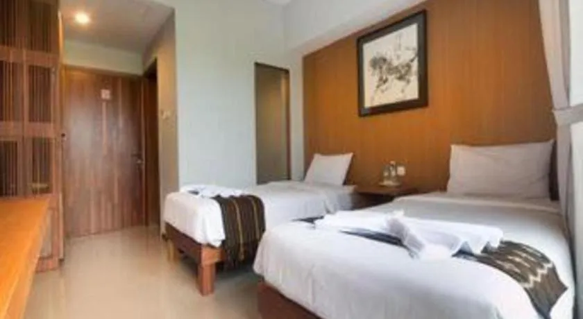 Bed in Hadi Poetra Hotel