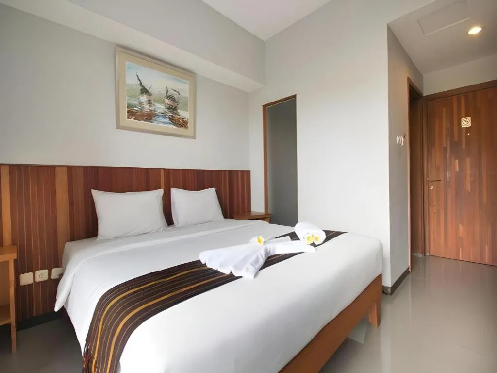 Bed in Hadi Poetra Hotel
