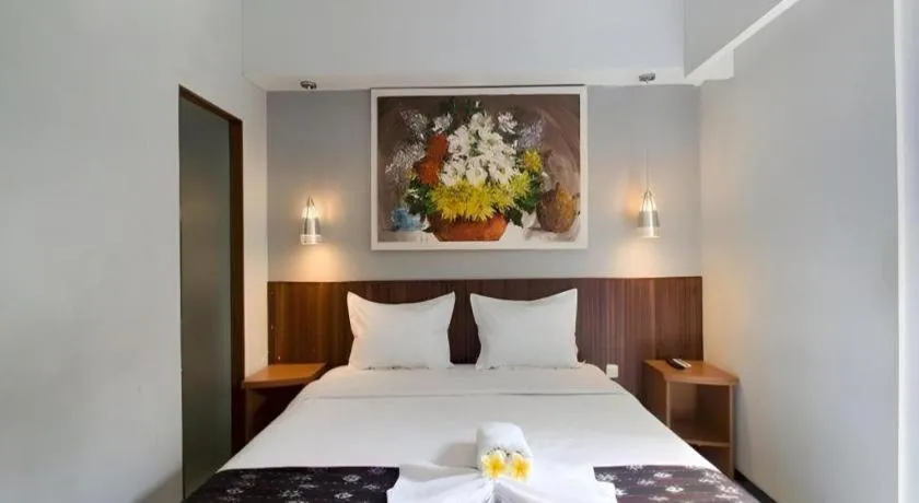 Bed in Hadi Poetra Hotel