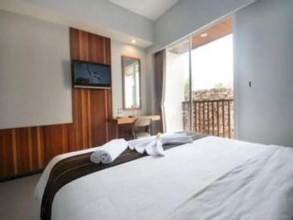 Bed in Hadi Poetra Hotel