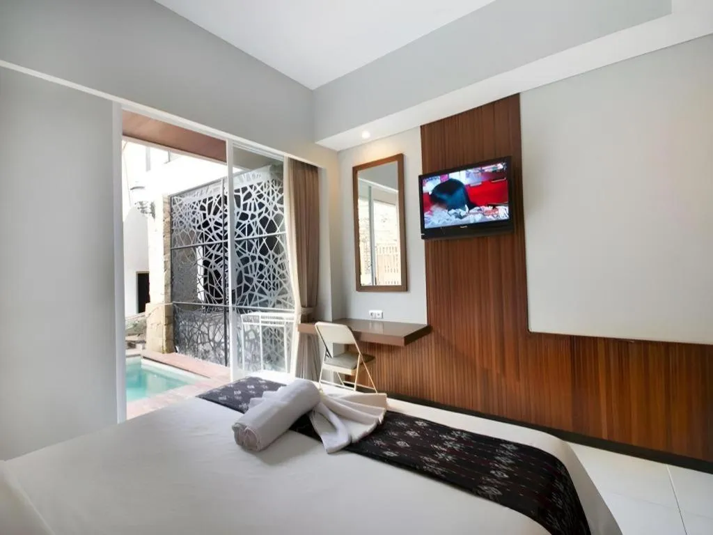 Bed in Hadi Poetra Hotel