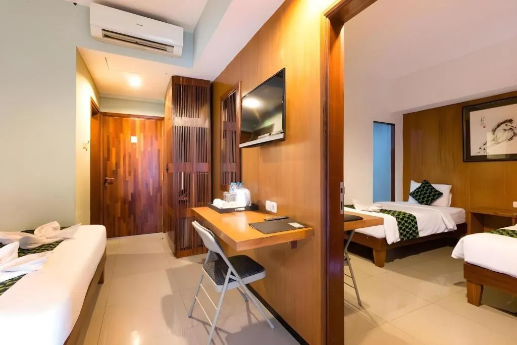 Bed in Hadi Poetra Hotel