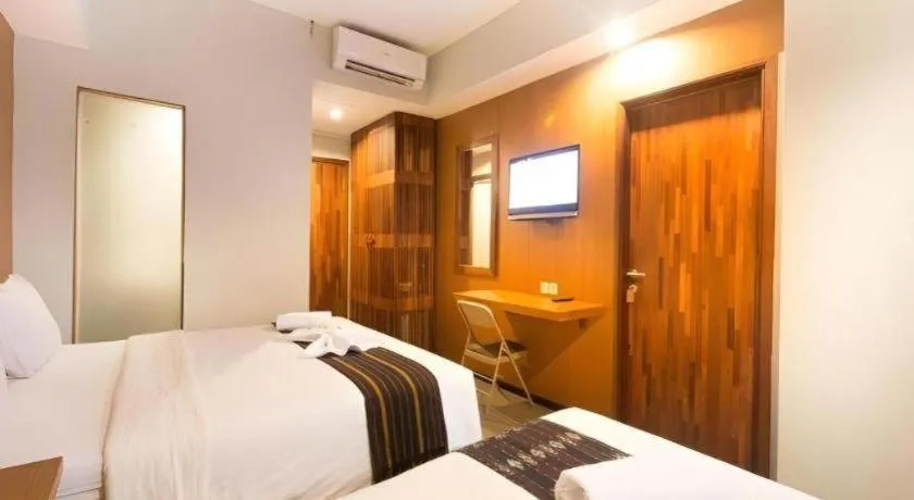 Bed in Hadi Poetra Hotel