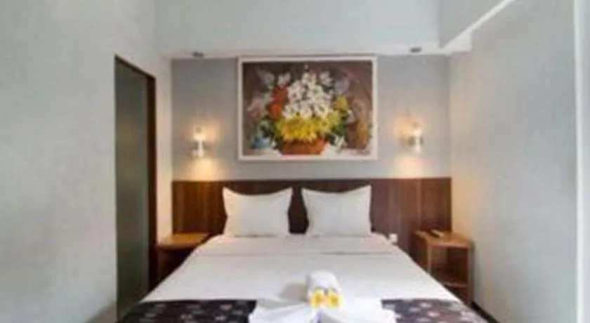 Bed in Hadi Poetra Hotel