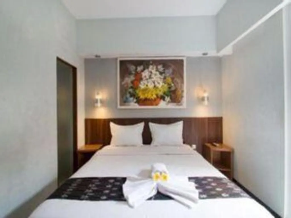 Bed in Hadi Poetra Hotel