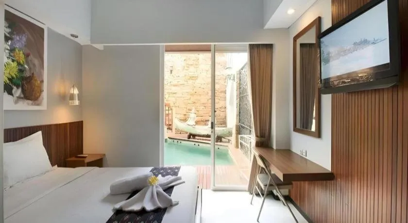 Bed in Hadi Poetra Hotel