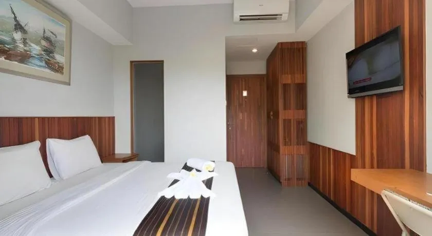 Bed in Hadi Poetra Hotel