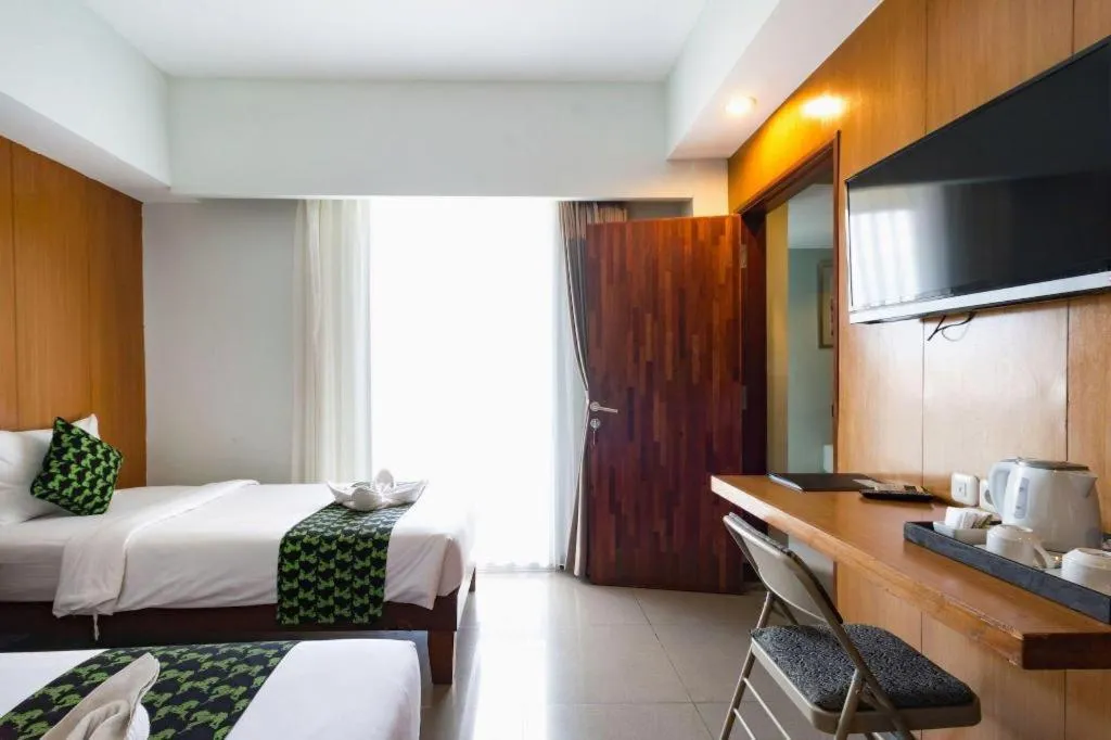 Bed in Hadi Poetra Hotel