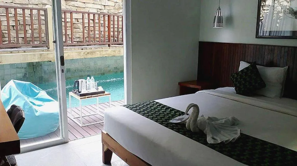 Bed in Hadi Poetra Hotel