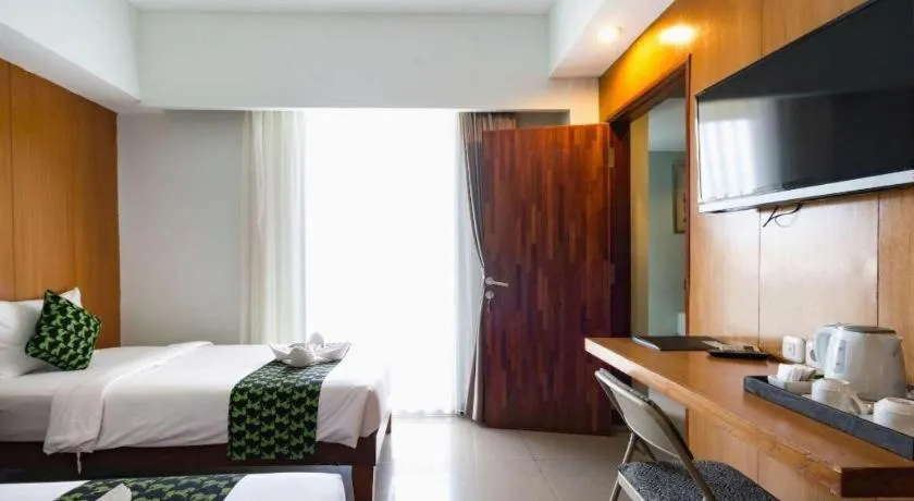 Bed in Hadi Poetra Hotel