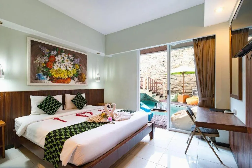 Bed in Hadi Poetra Hotel