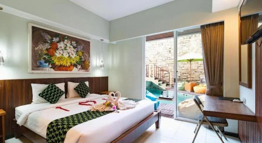 Bed in Hadi Poetra Hotel