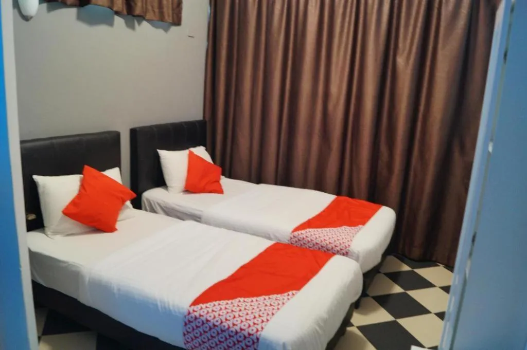 Bed in BudgetOne Hotel