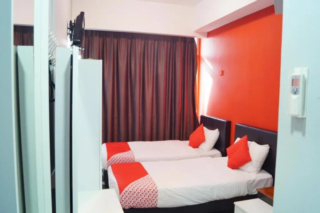 Bed in BudgetOne Hotel