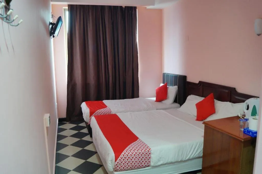 Bed in BudgetOne Hotel