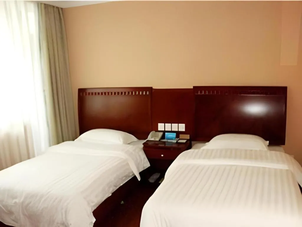 Bed in Chongqing Tianyou Hotel