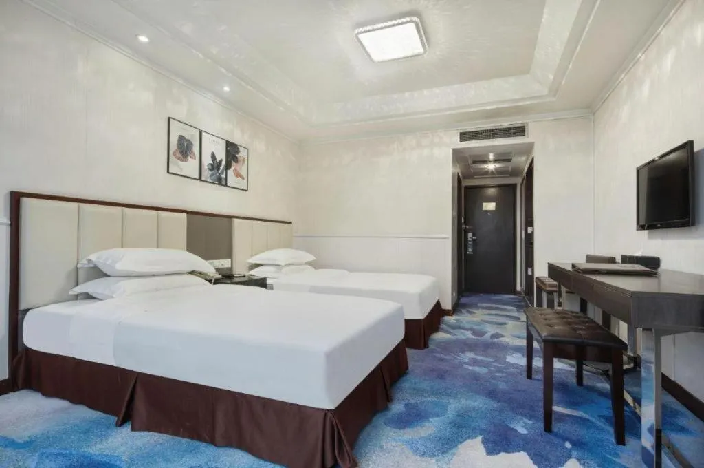 Bed in Chongqing Tianyou Hotel