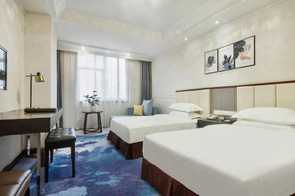 Bed in Chongqing Tianyou Hotel