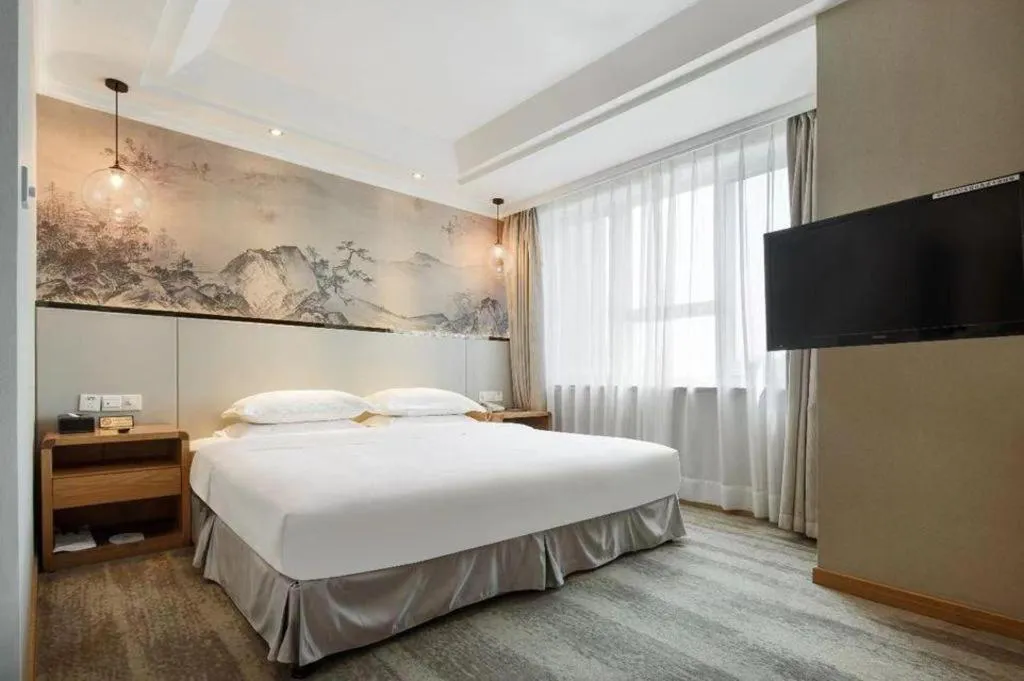 Bed in Chongqing Tianyou Hotel