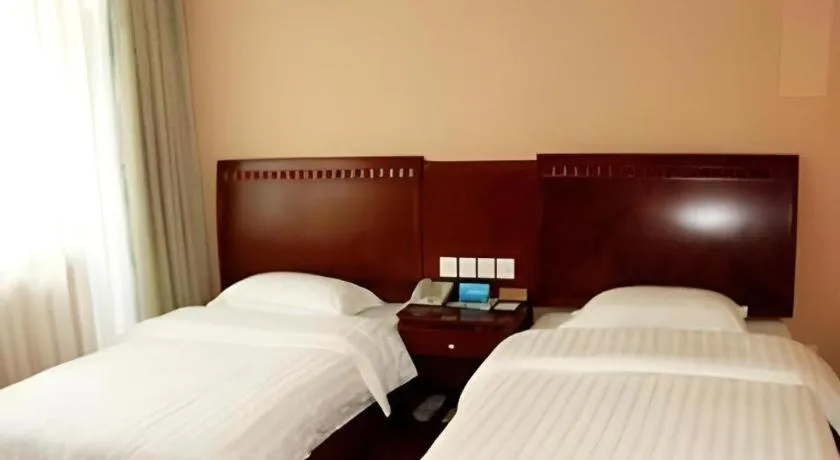 Bed in Chongqing Tianyou Hotel