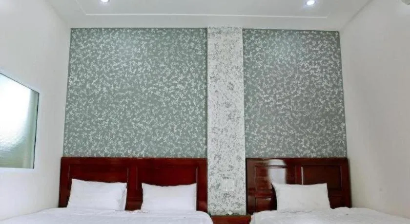 Bed in Ngoc Bach Hotel