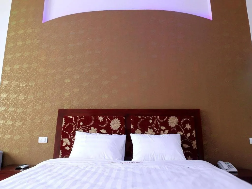 Bed in Ngoc Bach Hotel