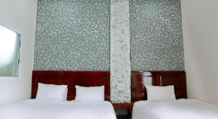 Bed in Ngoc Bach Hotel