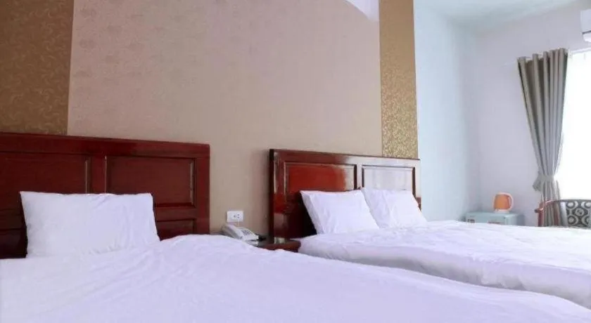 Bed in Ngoc Bach Hotel