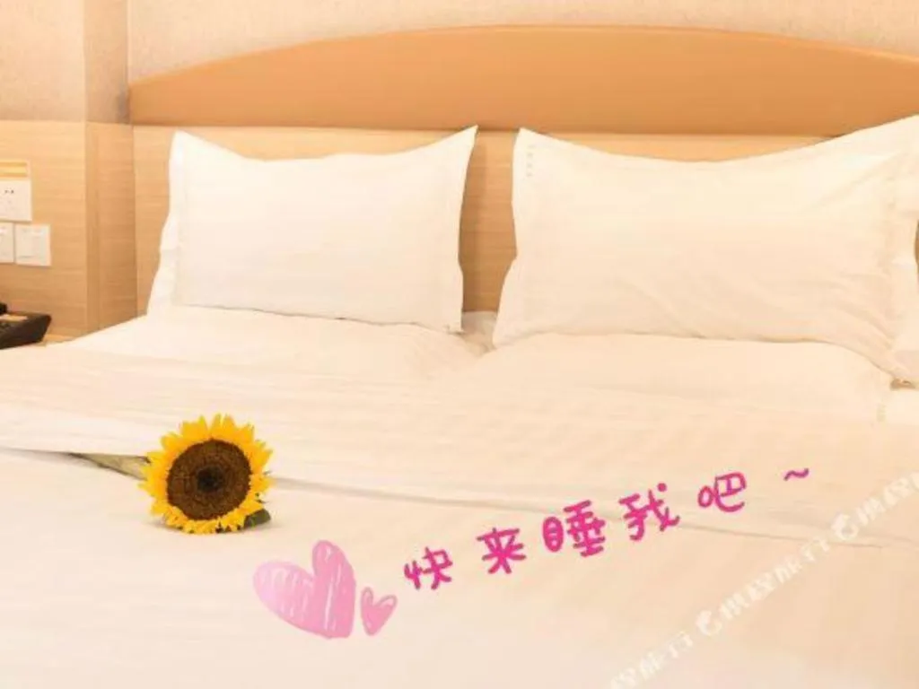 Bed in 7 Days Inn Chongqing Nanping Wanda Plaza Exhibition Center