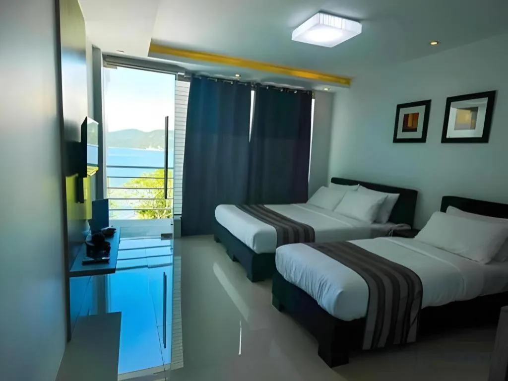 Bed in Anilao Awari Bay Resort